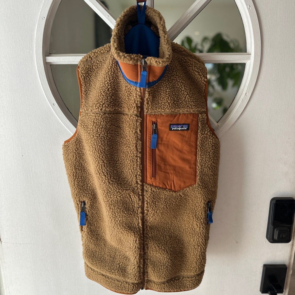 Patagonia Tan Sherpa Fleece Vest with Orange Chest Pocket and Blue Accents